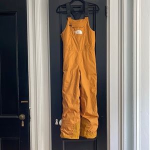 The North face insulated bib kids  color Carhartt brown tan kids large